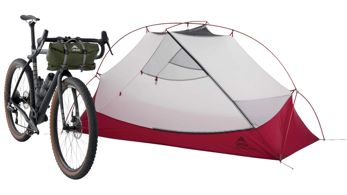 Red and gray tent with a bicycle on a white background
